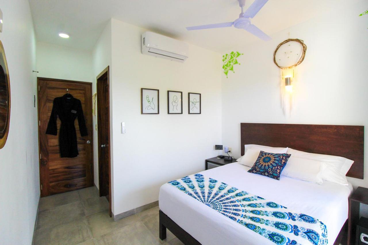 Casa De Olas Boutique Hotel ปูแอร์โตเอสกอนดิโด ภายนอก รูปภาพ
